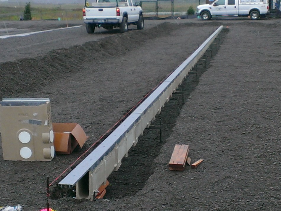 FedEx (Salem OR) - 100' using channel sections 1 - 30, installed by 3 people before noon using the Rapid Trench system.