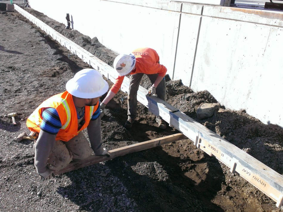 Slide 3a - FedEx (Portland OR) - raising the module in place and securing to the tongue of the installed section.